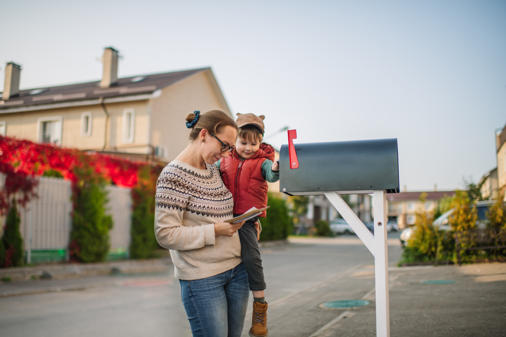 Mother and child checking their mail